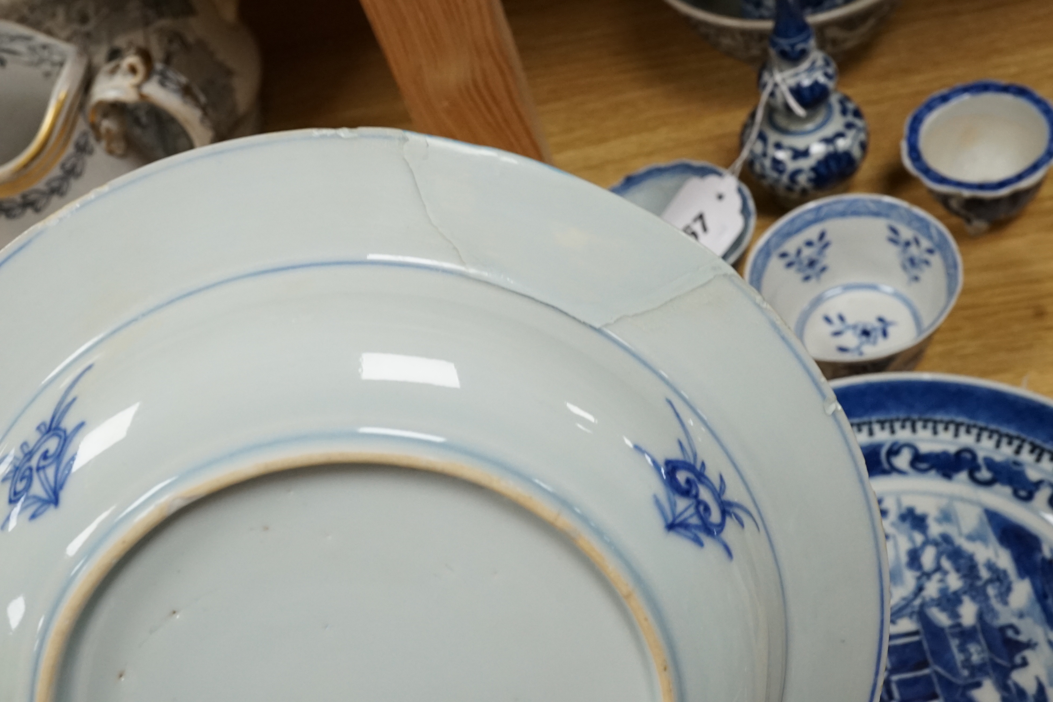 A quantity of blue and white Chinese porcelain dishes and vessels, 18th century and later, tallest 22.5cm